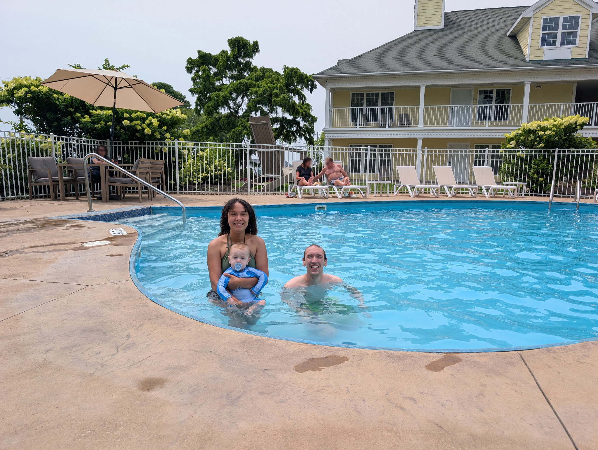 Aubri, Calvin and I enjoying the pool while waiting for our room.